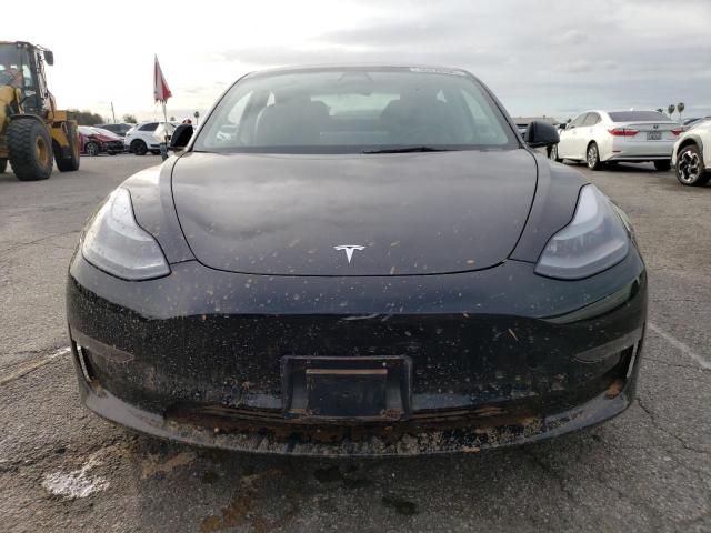 Photo 5 from auction – 2022 TESLA MODEL 3 with VIN 5YJ3E1EB3NF323806