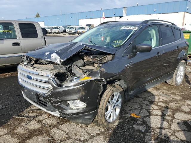 FORD ESCAPE SE 2018 with VIN 1FMCU0GDXJUB40377 - Photo from auction