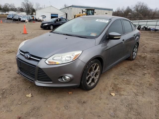 FORD FOCUS SE 2014 with VIN 1FADP3F24EL164998 - Photo from auction