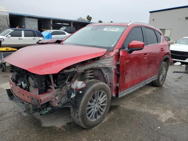 MAZDA CX-5 TOURI 2021 with VIN JM3KFACM8M0311619 - Photo from auction