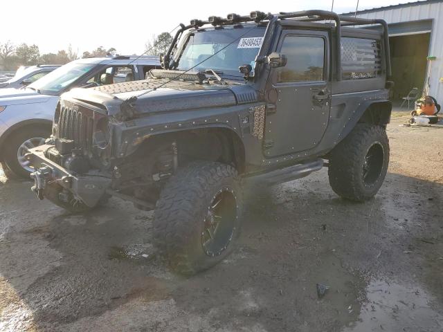 JEEP WRANGLER S 2014 with VIN 1C4AJWAG8EL245067 - Photo from auction