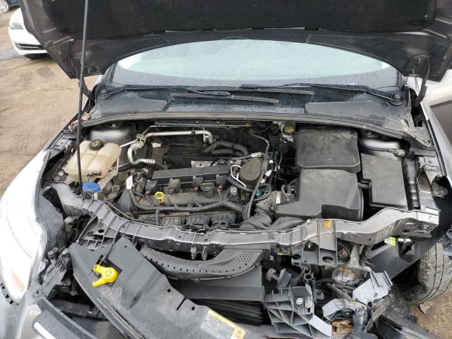 Photo 11 from auction – 2014 FORD FOCUS S with VIN 1FADP3E24EL218074