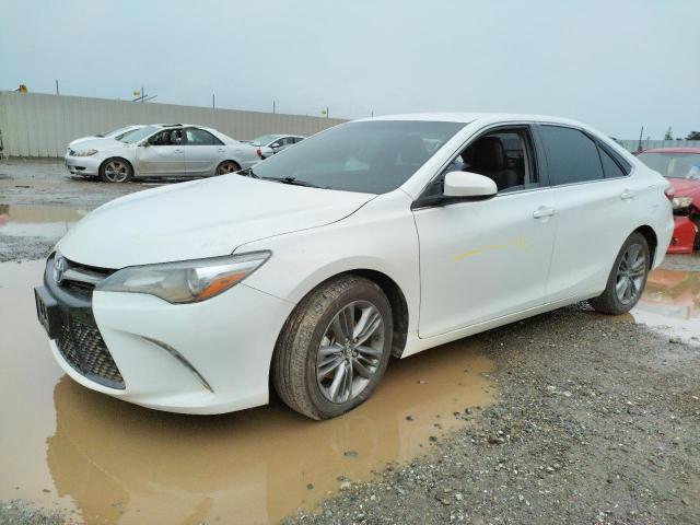 TOYOTA CAMRY LE 2017 with VIN 4T1BF1FKXHU357207 - Photo from auction