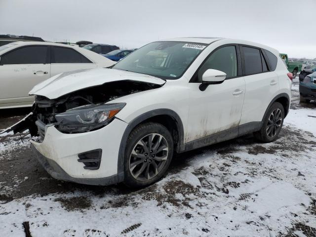 MAZDA CX-5 GT 2016 with VIN JM3KE4DY3G0852619 - Photo from auction