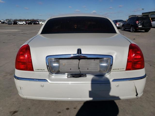 Photo 6 from auction – 2004 LINCOLN TOWN CAR U with VIN 1LNHM83W54Y688893