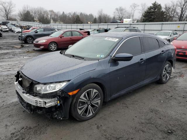 Photo 1 from auction – 2018 HONDA CIVIC EX with VIN JHMFC1F33JX043389