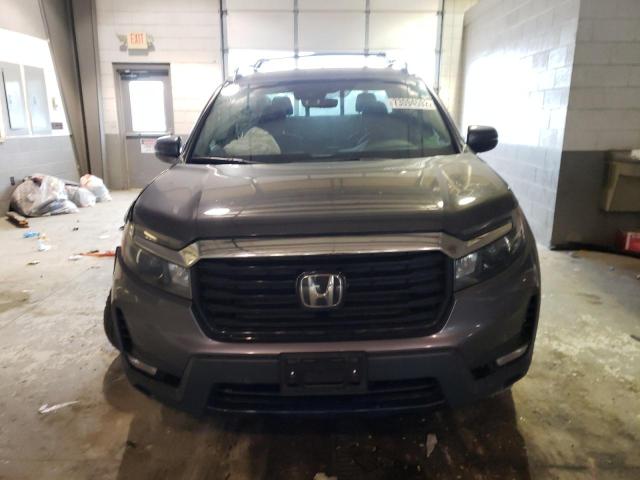 Photo 5 from auction – 2022 HONDA RIDGELINE with VIN 5FPYK3F79NB017544