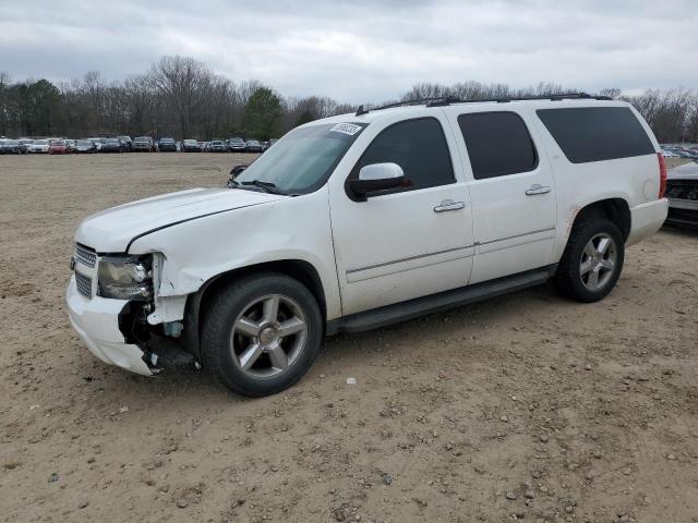 CHEVROLET SUBURBAN K 2010 with VIN 1GNUKKE33AR129011 - Photo from auction