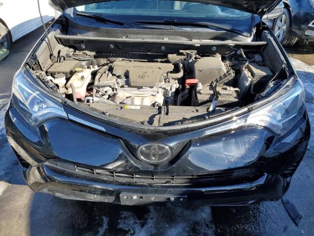 Photo 12 from auction – 2018 TOYOTA RAV4 LE with VIN 2T3BFREV0JW779543
