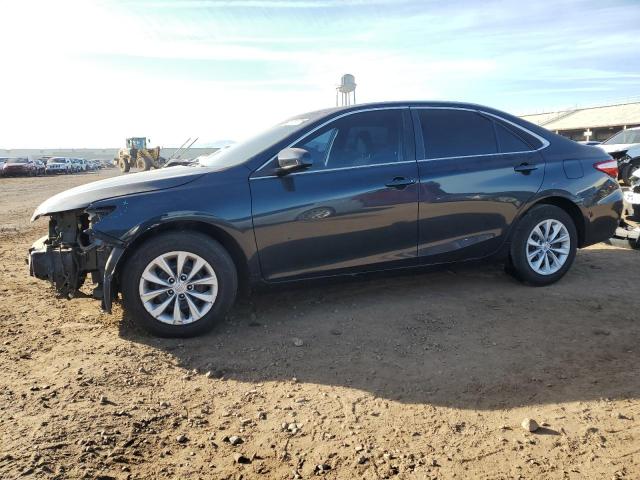 TOYOTA CAMRY LE 2017 with VIN 4T1BF1FK7HU678816 - Photo from auction