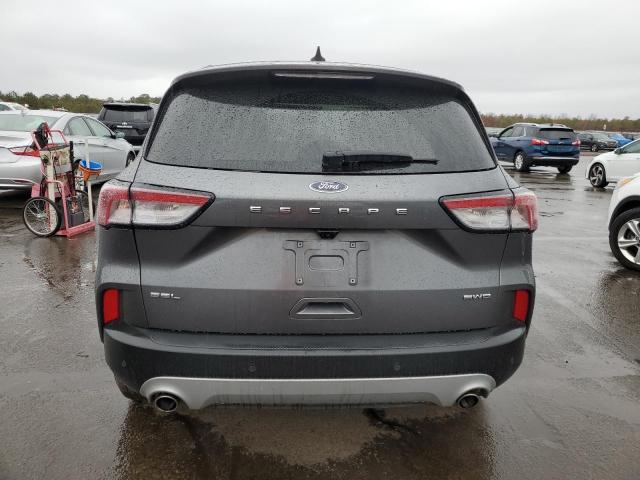 Photo 6 from auction – 2021 FORD ESCAPE SEL with VIN 1FMCU9H69MUB09548