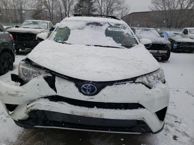 Photo 5 from auction – 2018 TOYOTA RAV4 with VIN JTMRJREV0JD228524