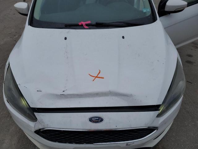 Photo 11 from auction – 2016 FORD FOCUS SE with VIN 1FADP3F27GL329929