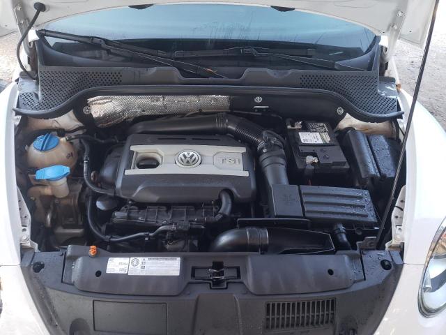 Photo 11 from auction – 2012 VOLKSWAGEN BEETLE TUR with VIN 3VWVA7AT6CM605501