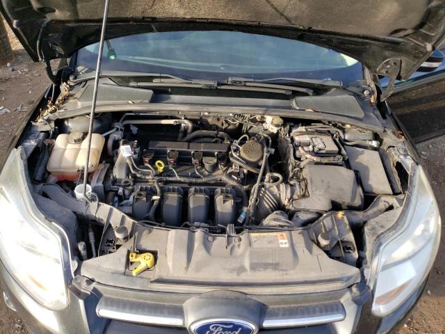 Photo 11 from auction – 2014 FORD FOCUS SE with VIN 1FADP3F24EL130463