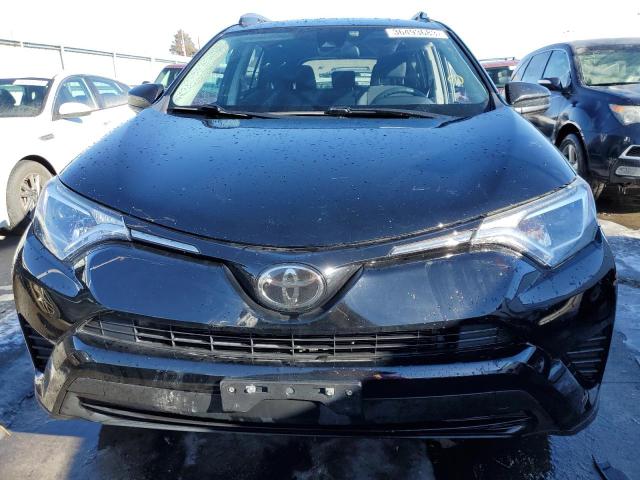 Photo 5 from auction – 2018 TOYOTA RAV4 LE with VIN 2T3BFREV0JW779543