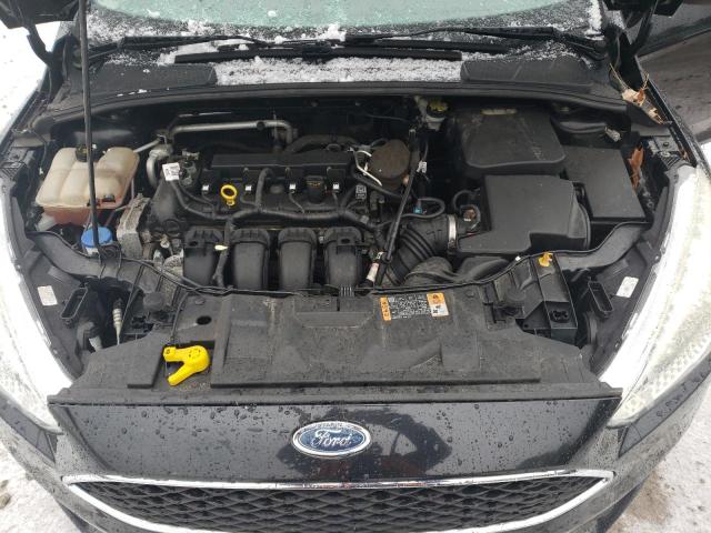 Photo 11 from auction – 2015 FORD FOCUS SE with VIN 1FADP3F28FL226341