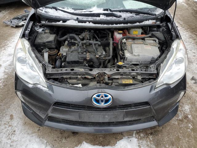 Photo 11 from auction – 2014 TOYOTA PRIUS C with VIN JTDKDTB38E1062897