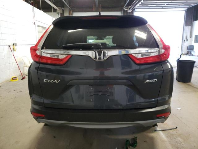 Photo 6 from auction – 2018 HONDA CR-V EX with VIN 7FARW2H51JE007306
