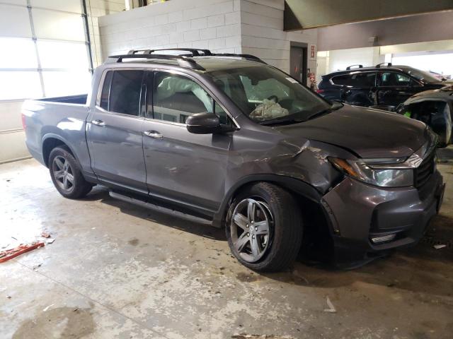 Photo 4 from auction – 2022 HONDA RIDGELINE with VIN 5FPYK3F79NB017544