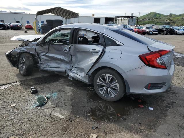 Photo 2 from auction – 2016 HONDA CIVIC EX with VIN 2HGFC1F37GH653201