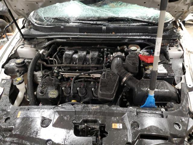 Photo 11 from auction – 2015 FORD TAURUS SEL with VIN 1FAHP2E80FG206577