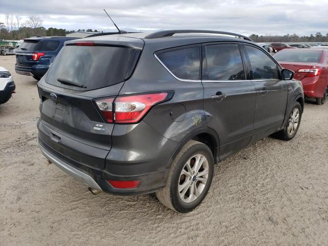Photo 3 from auction – 2018 FORD ESCAPE with VIN 1FMCU9GD6JUC13152