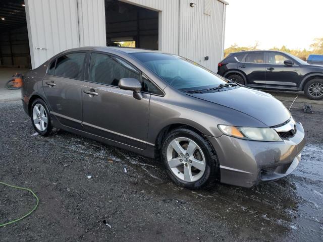 Photo 4 from auction – 2011 HONDA CIVIC LX-S with VIN 19XFA1F67BE009880