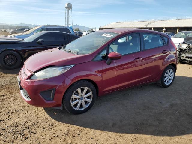 FORD FIESTA SE 2011 with VIN 3FADP4EJ2BM130213 - Photo from auction