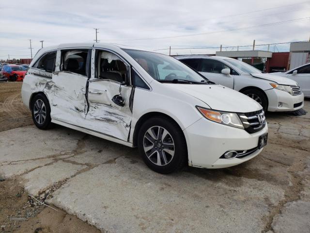 Photo 4 from auction – 2014 HONDA ODYSSEY TO with VIN 5FNRL5H97EB031897