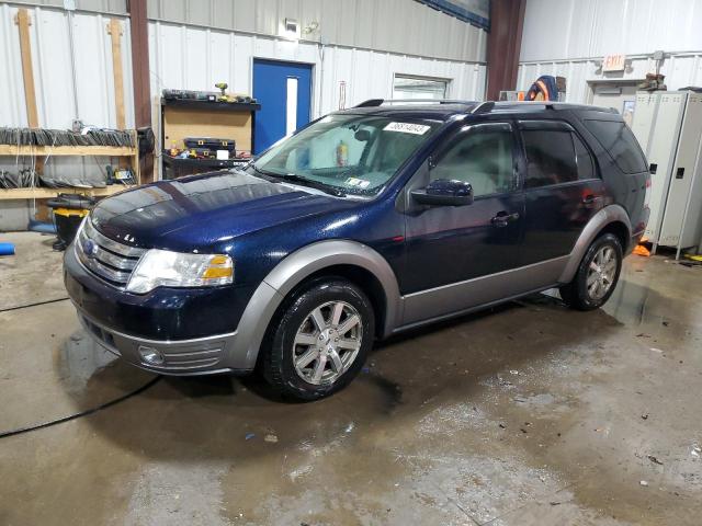 FORD TAURUS X S 2009 with VIN 1FMDK02WX9GA05591 - Photo from auction