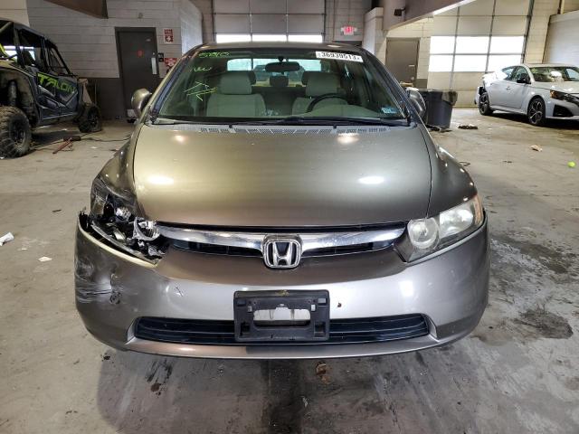 Photo 5 from auction – 2007 HONDA CIVIC HYBR with VIN JHMFA36277S022611