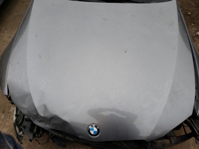 Photo 11 from auction – 2011 BMW 3 SERIES with VIN WBAKE3C53BE557314