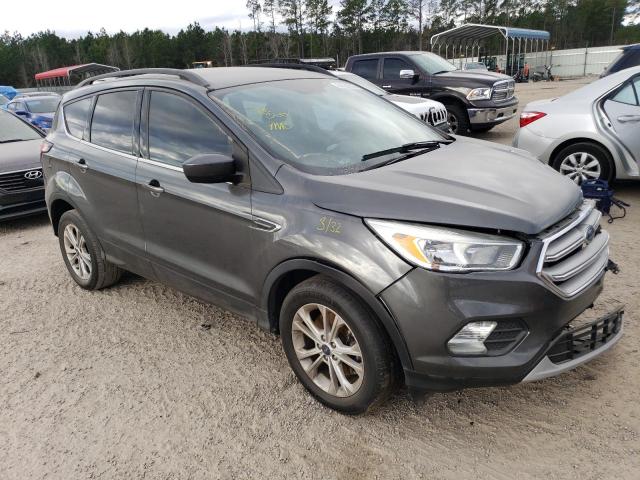 Photo 4 from auction – 2018 FORD ESCAPE with VIN 1FMCU9GD6JUC13152