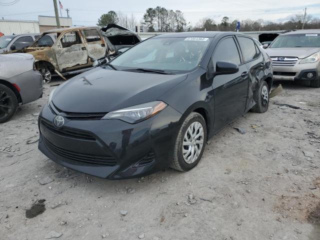 TOYOTA COROLLA L 2017 with VIN 5YFBURHE9HP710467 - Photo from auction