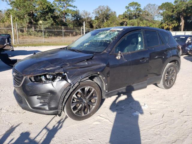 MAZDA CX-5 GT 2016 with VIN JM3KE2DY6G0824009 - Photo from auction