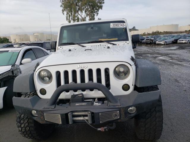 Photo 5 from auction – 2016 JEEP WRANGLER U with VIN 1C4BJWDG3GL229121