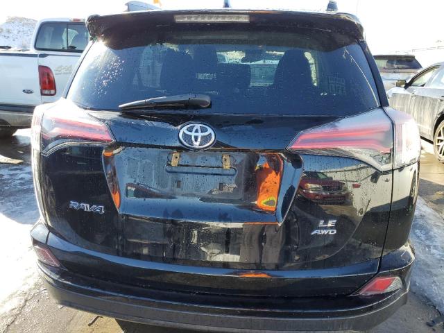 Photo 6 from auction – 2018 TOYOTA RAV4 LE with VIN 2T3BFREV0JW779543