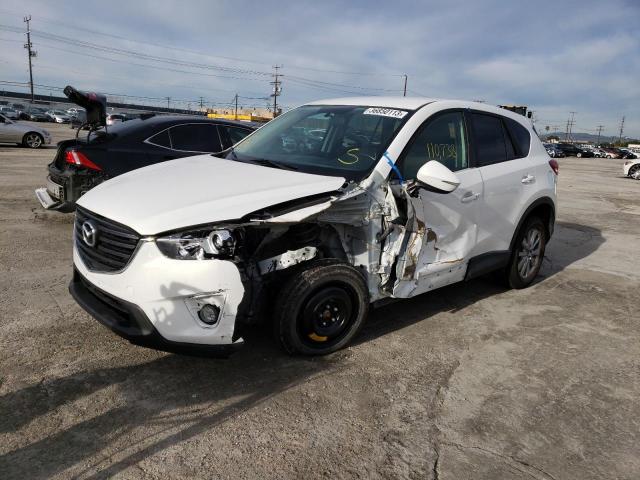 MAZDA CX-5 TOURI 2016 with VIN JM3KE2CY1G0878884 - Photo from auction