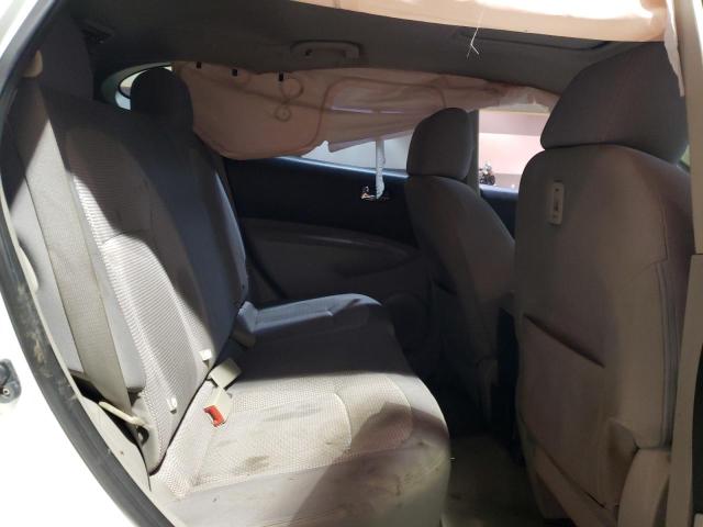 Photo 11 from auction – 2013 NISSAN ROGUE S with VIN JN8AS5MV2DW623144