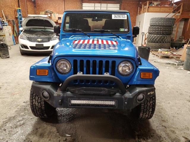 Photo 5 from auction – 2003 JEEP WRANGLER C with VIN 1J4FA39S53P361713