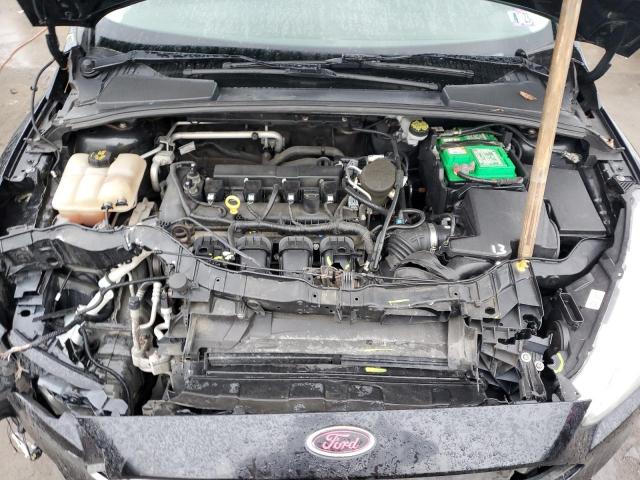 Photo 11 from auction – 2015 FORD FOCUS SE with VIN 1FADP3F28FL249957