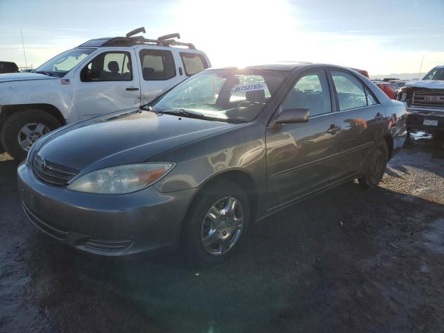 TOYOTA CAMRY LE 2002 with VIN 4T1BE32KX2U590998 - Photo from auction