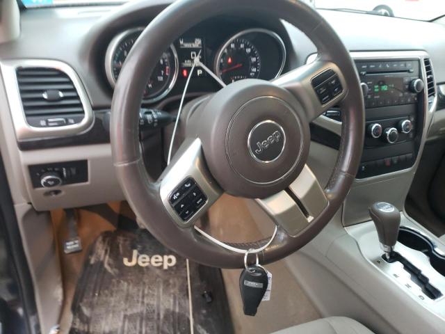 Photo 8 from auction – 2011 JEEP GRAND CHER with VIN 1J4RR4GG1BC657702