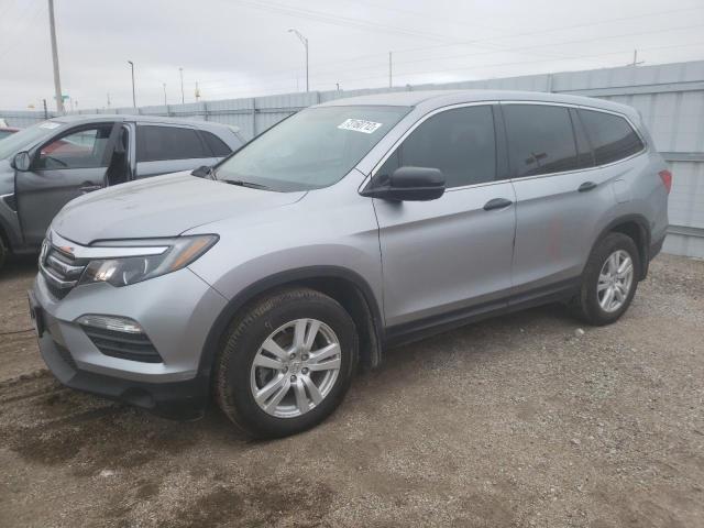HONDA PILOT LX 2018 with VIN 5FNYF6H12JB033750 - Photo from auction