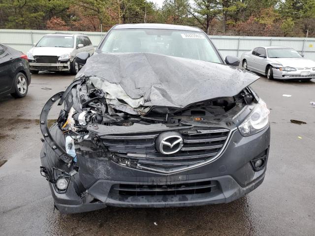 Photo 5 from auction – 2016 MAZDA CX-5 TOURI with VIN JM3KE4CY1G0914570