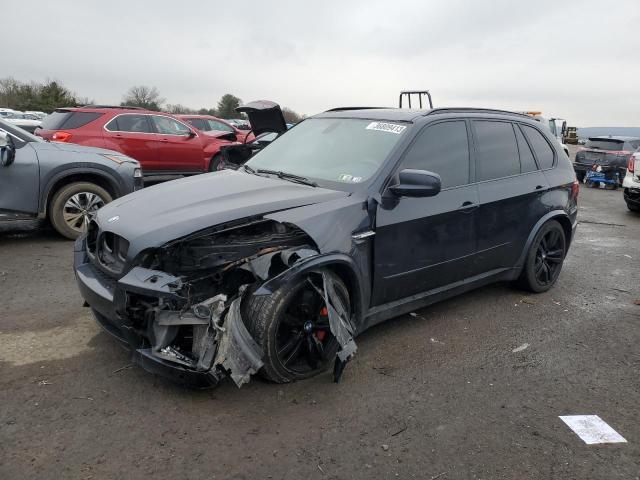 BMW X5 M 2011 with VIN 5YMGY0C53BLK26878 - Photo from auction