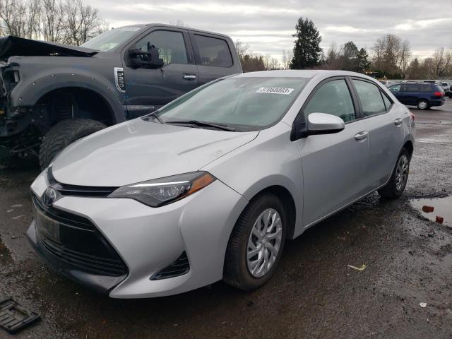 TOYOTA COROLLA L 2018 with VIN 2T1BURHE9JC121005 - Photo from auction
