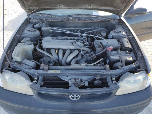 Photo 11 from auction – 1999 TOYOTA COROLLA VE with VIN 2T1BR18E2XC231227