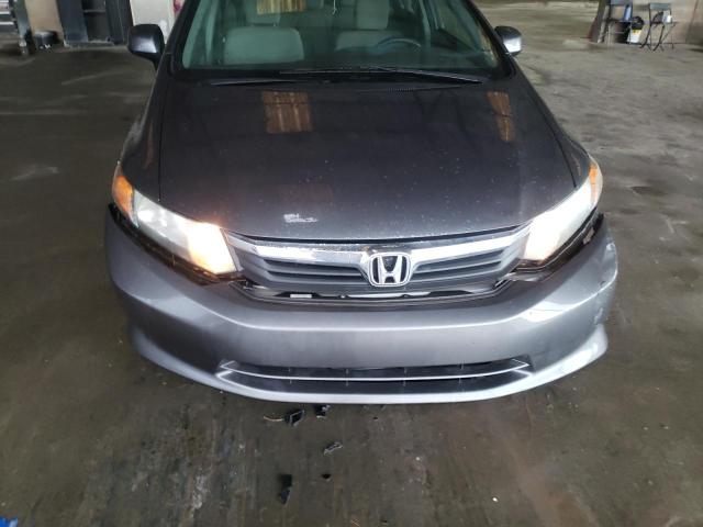 Photo 11 from auction – 2012 HONDA CIVIC DX with VIN 19XFB2F51CE035533